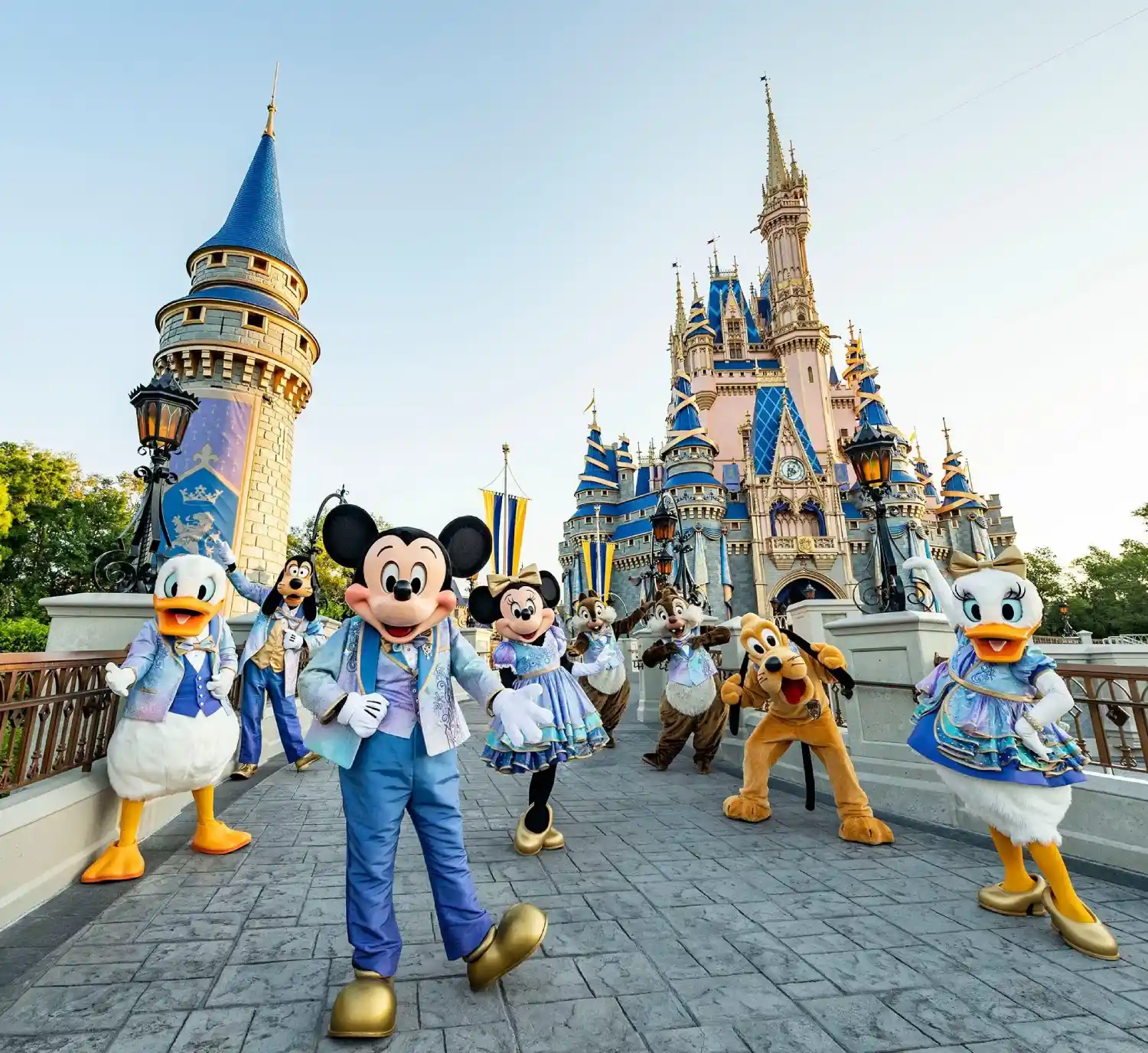 a group of people in Disney world clothing